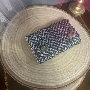 Betty Boop metallic silver/blue clutch with zipper pouch and extra slot.